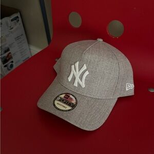 New Era Light Gray Cap with White Emblem